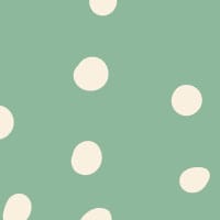 Inverted green polka dot wallpaper situated in kids bedroom with a play tent
