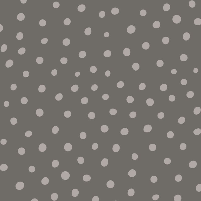 Inverted grey polka dot wallpaper situated in kids bedroom with a play tent