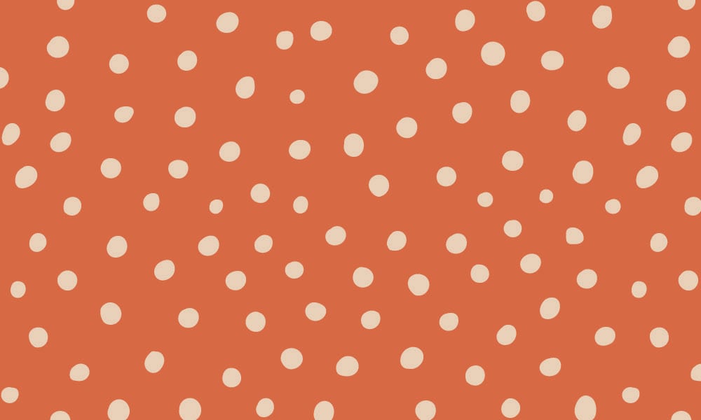 Red toned polka dot wallpaper design