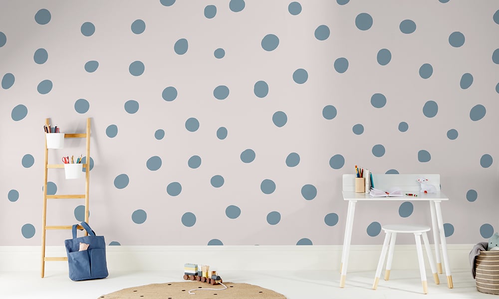 Blue polka dot wallpaper in a large size with a ladder