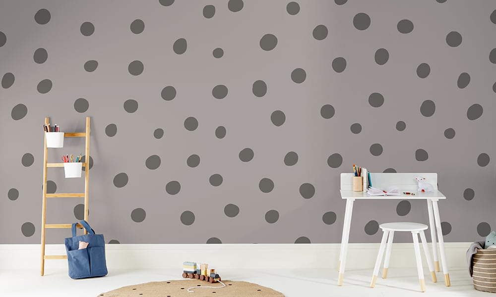 Grey polka dot wallpaper in a large size with a ladder