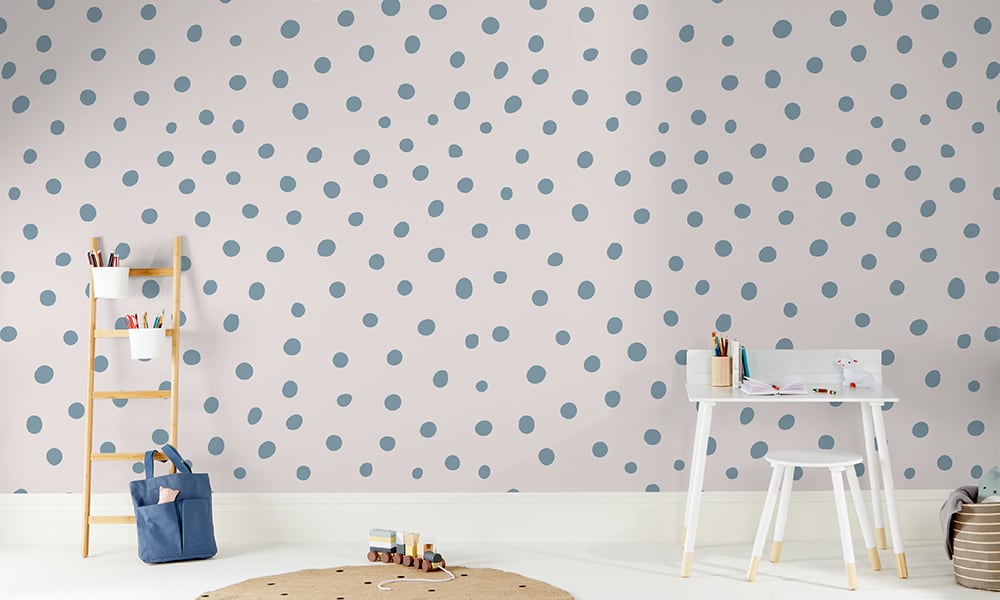 Blue and white polka dot wallpaper in a medium size situated in kids bedroom
