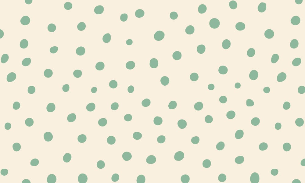 Off-white and green polka dot wallpaper design