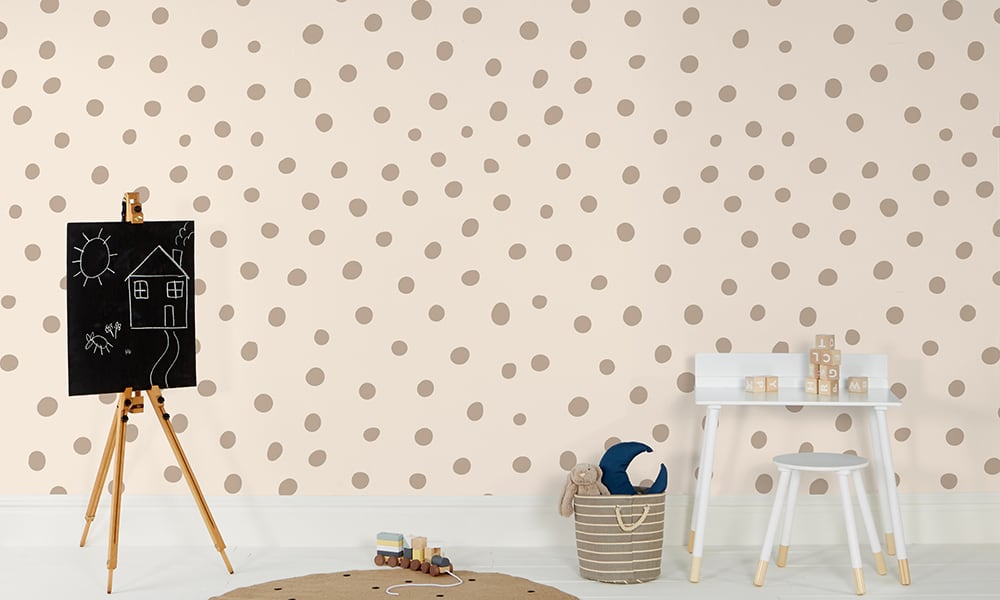 Polka dot wallpaper in neutral colour and medium size situated in kids bedroom