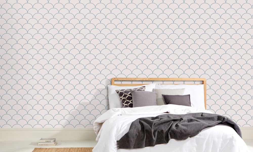 Scales wallpaper design in blue and a medium size with bed and book