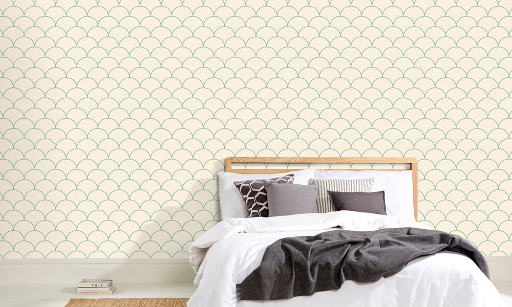 Scales wallpaper design in green and medium size with bed