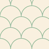 Scales green wallpaper design situated in bedroom with grey cushions and books