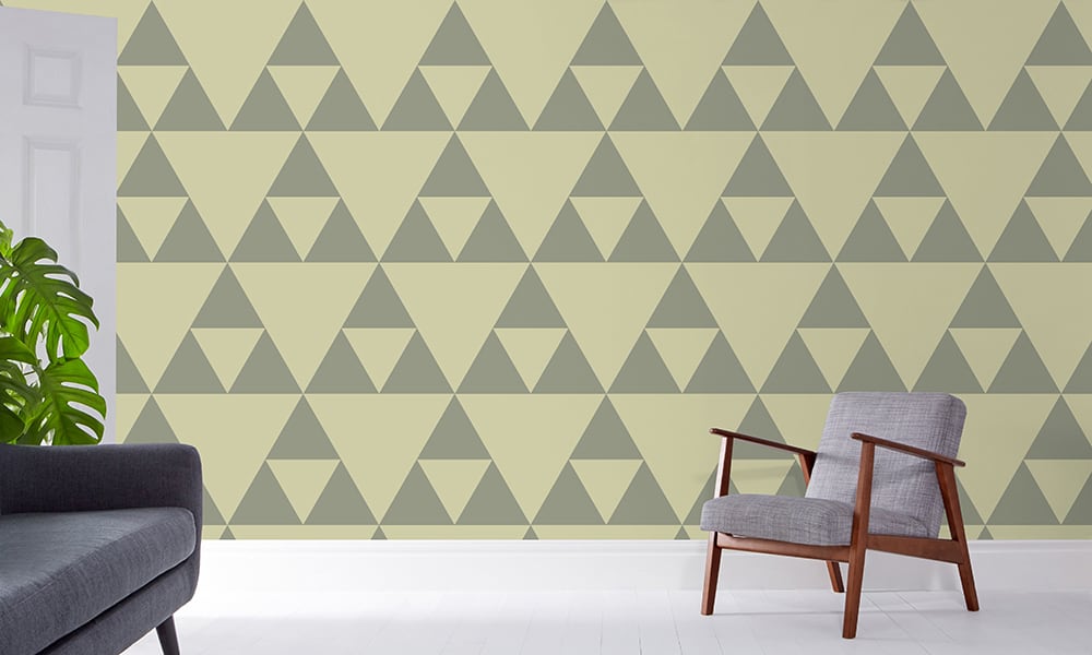 Green coloured traingle patterned wallpaper in large scale