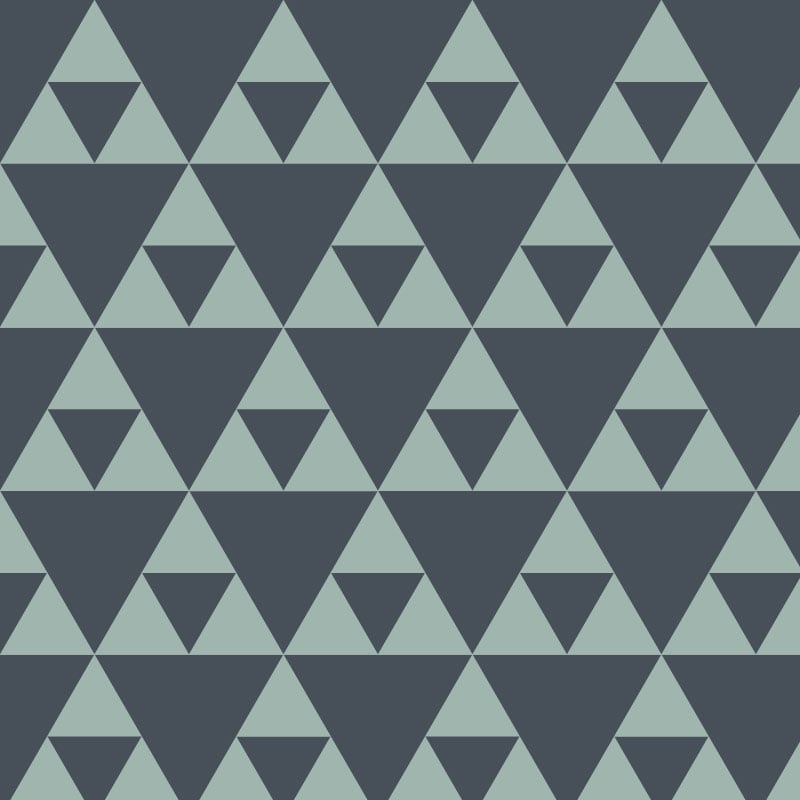 Sierpinski ocean coloured wallpaper in living room with grey chair