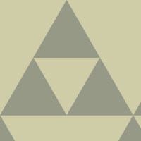 Sierpinski apple coloured wallpaper in living room with grey chair