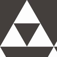 Sierpinski checker coloured wallpaper in living room with grey chair