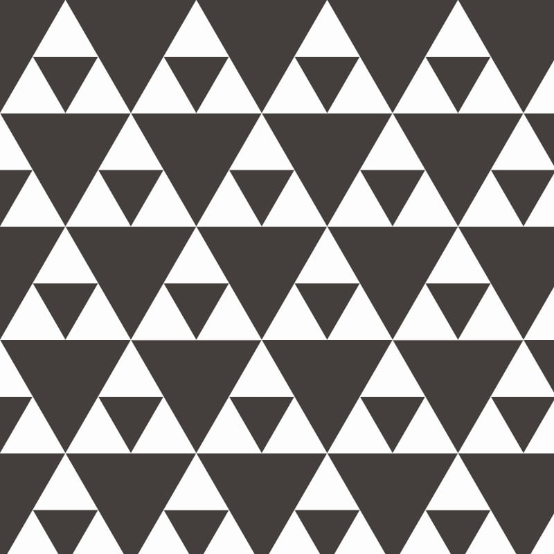 Sierpinski checker coloured wallpaper in living room with grey chair