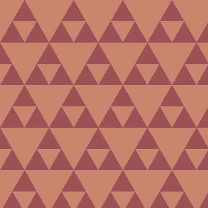 Sierpinski maroon coloured wallpaper in living room with grey chair