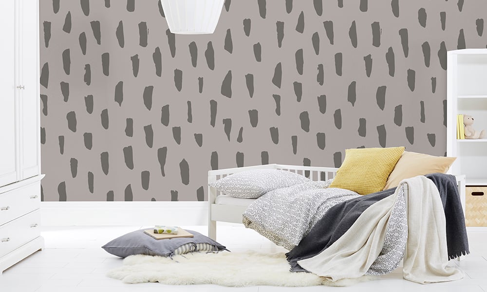 Large scale smudge wallpaper in grey colour in a kids bedroom