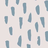 Blue smudge repeat pattern wallpaper in an kids bedroom