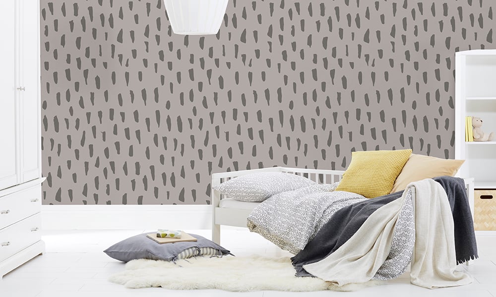 Medium scale smudge wallpaper in grey colour in a kids bedroom