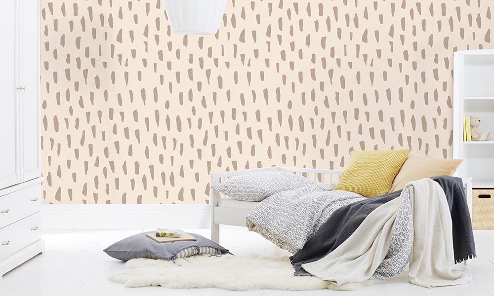 Medium scale smudge wallpaper in neutral colour in a kids bedroom