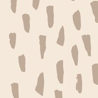 Neutral smudge repeat pattern wallpaper in a kids bedroom