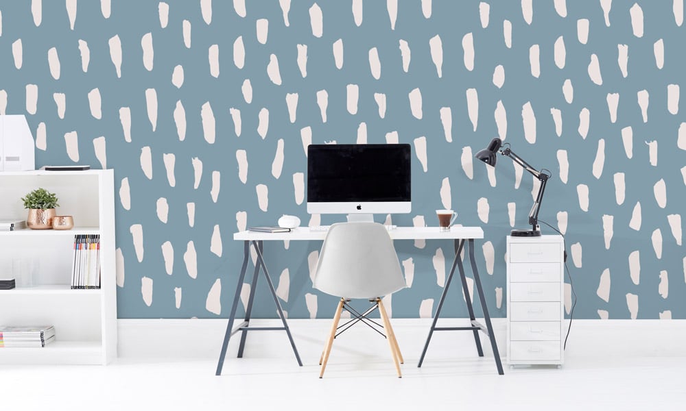 Large scale smudge wallpaper in blue colour in an office