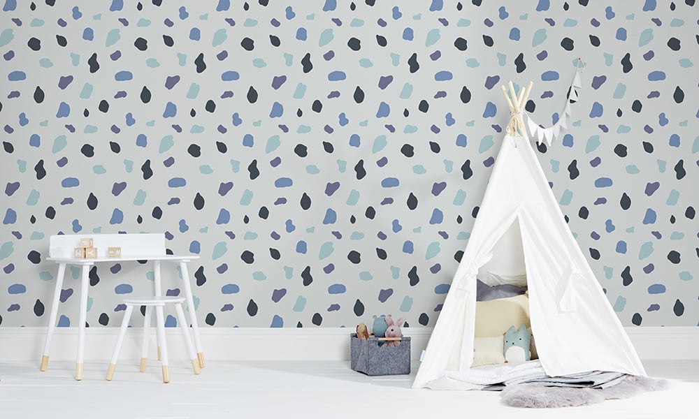 Medium scale splodge wallpaper in blue with play tent
