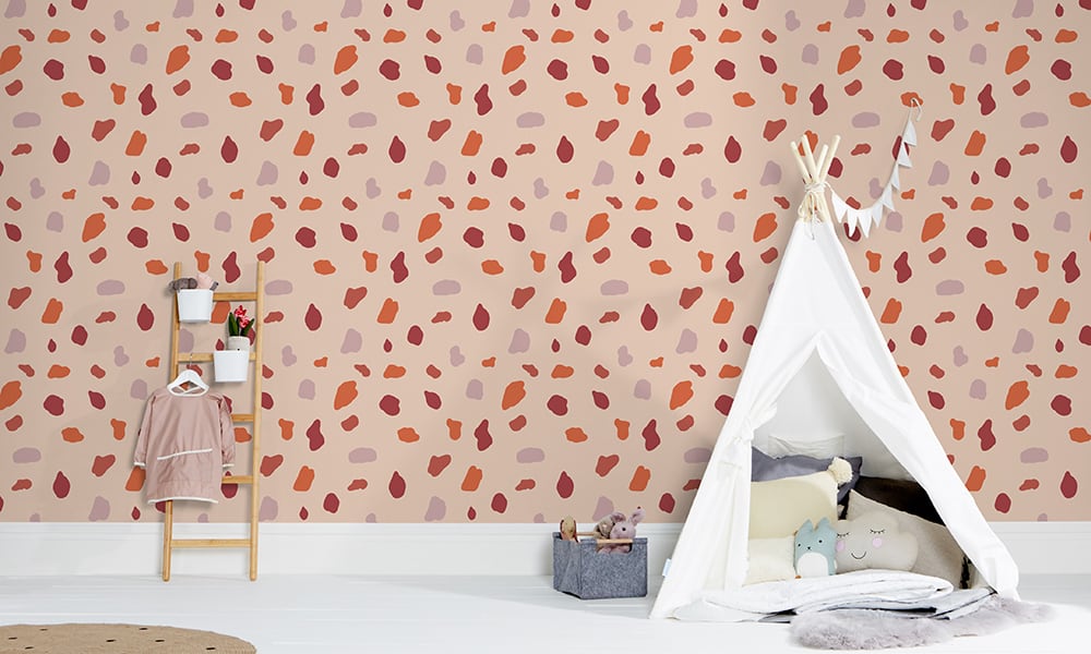 Medium scale splodge wallpaper in red with play ladder