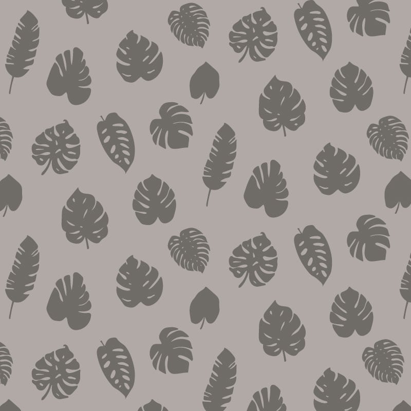 Grey leafy patterned wallpaper in living room with grey chair