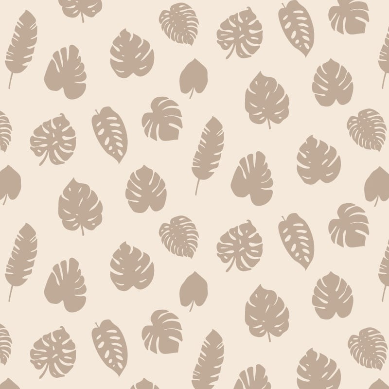 Tropic sand coloured wallpaper in a living area with chair and picture frame