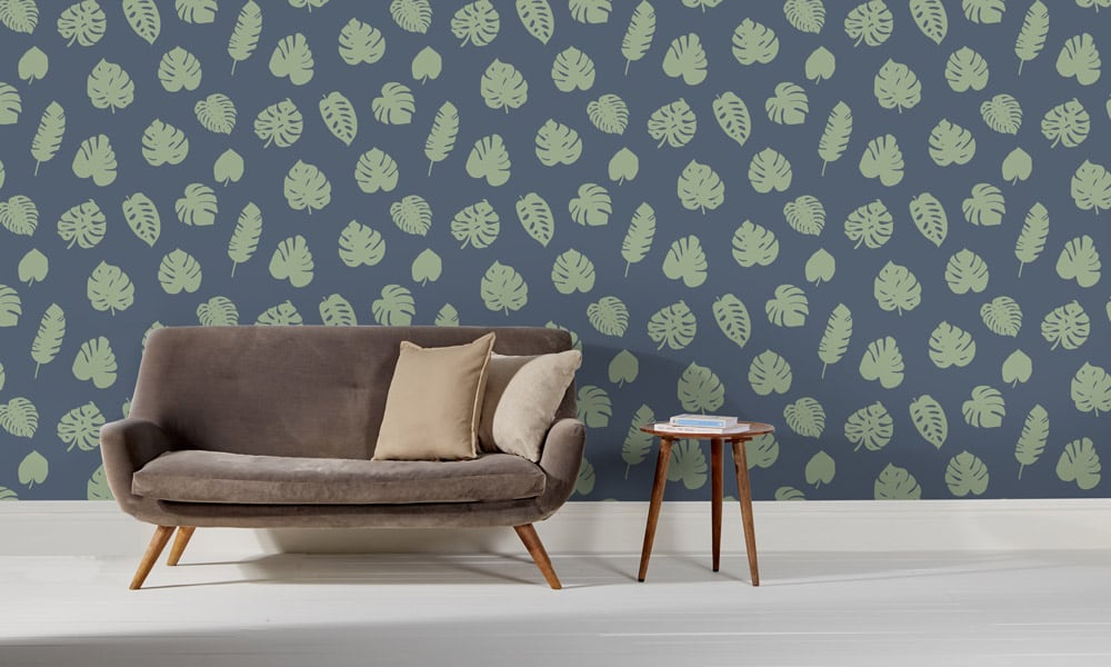 Medium scale wallpaper green leaves on blue background