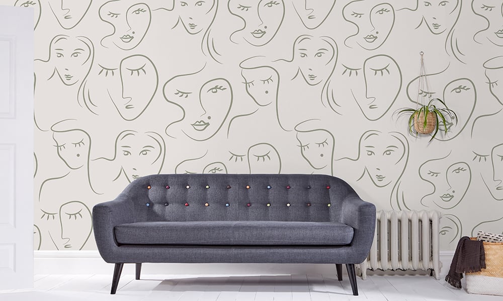Abstract sage faces pattern against neutral background wallpaper  