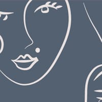 White faces pattern on blue background wallpaper situated in bedroom setting