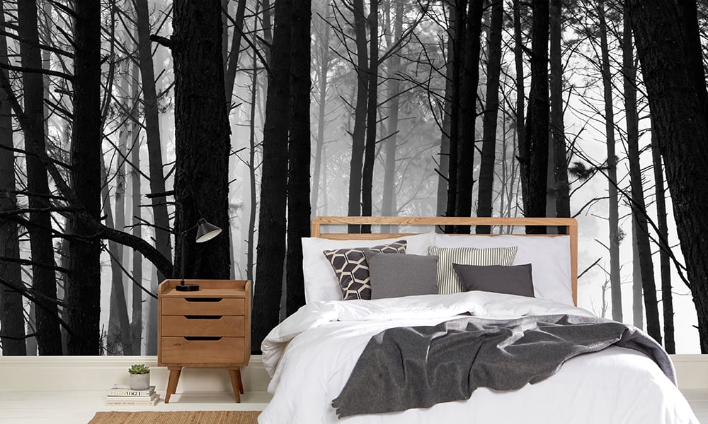 Bedroom with forest wallpaper in monochrome style 
